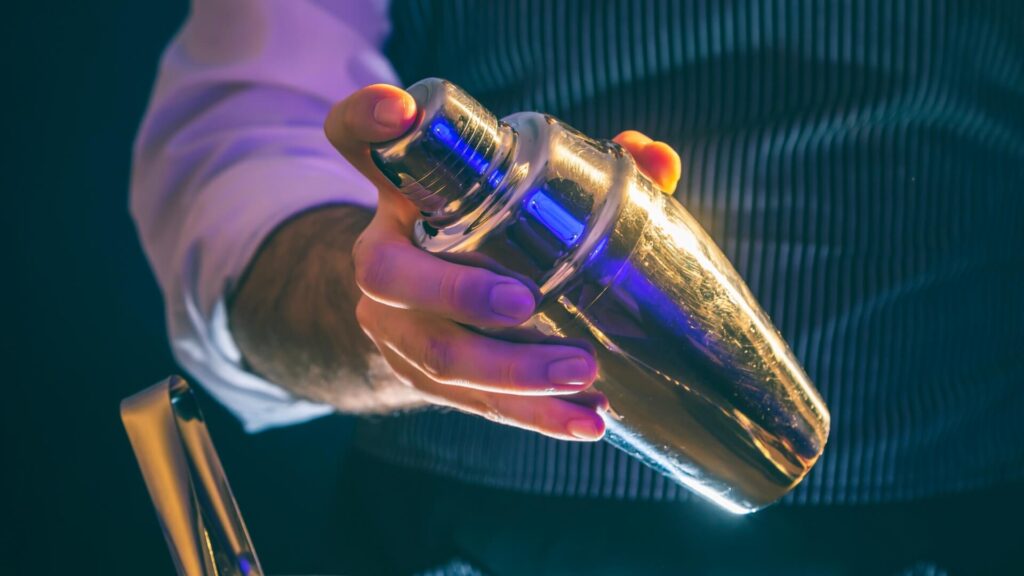 Essential bar tool - cocktail shaker in action